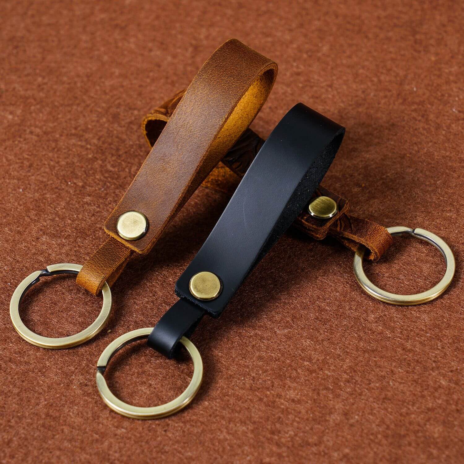 Handcrafted full grain leather keychain strap with metal ring in brown and black, anti-lost wrist loop accessory for car keys and earbuds case