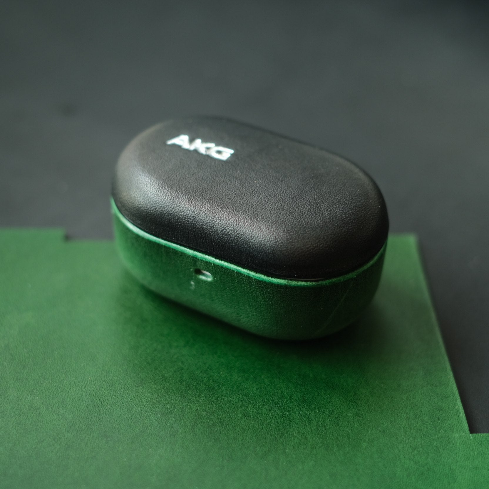 Handcrafted genuine leather earbuds case for AKG N5 in top black and bottom green