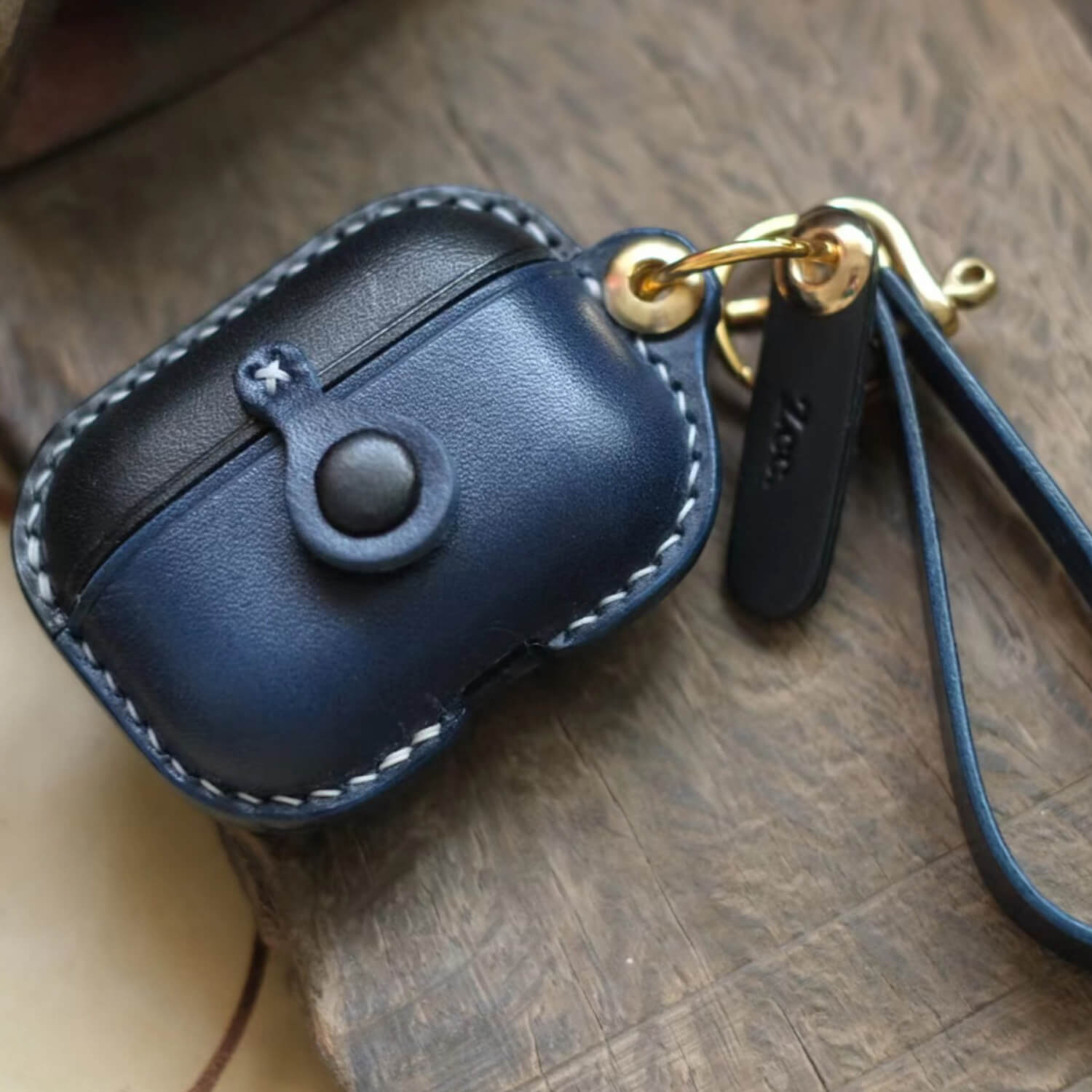 Two-tone - black and navy handcrafted personalized leather earbuds case for AirPods Pro 3 with side ring keychain and leather strap - Integrated design