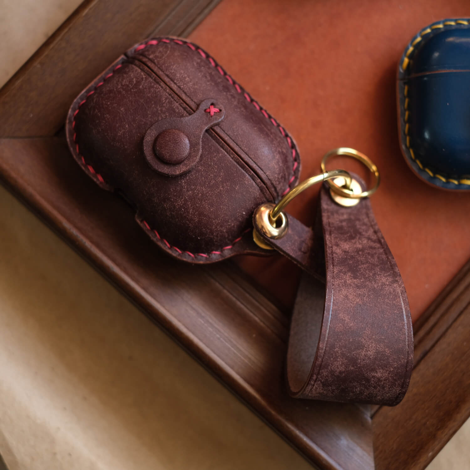 Matte brown handcrafted leather earbuds case for AirPods Pro 3 with portable leather strap - Integrated design