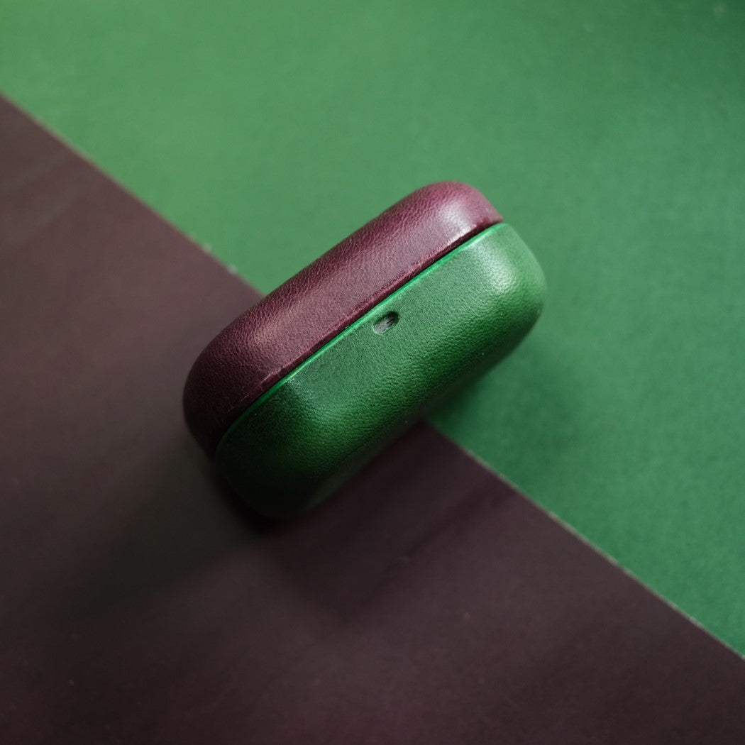 Close-up a white genuine leather earbud case designed for Bang and Olufsen Beoplay EX and Eleven