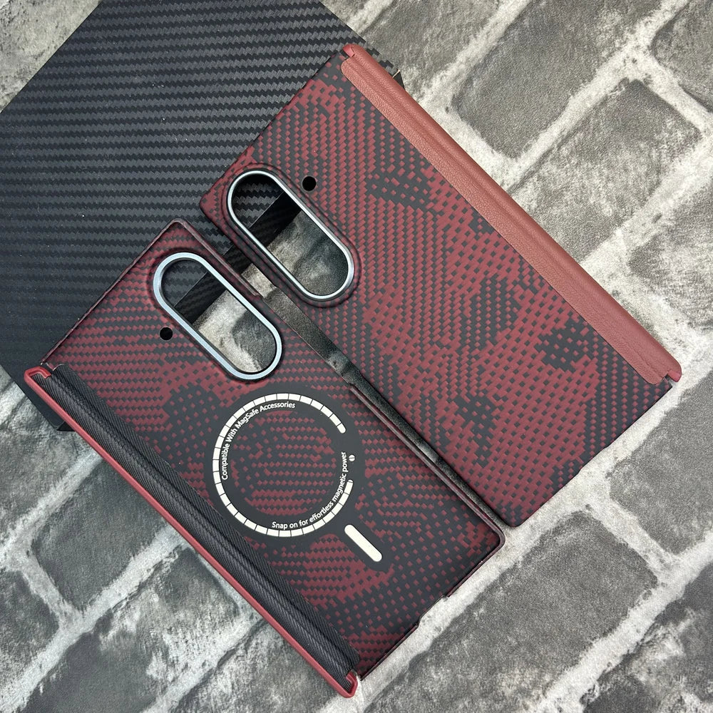 Camo red aramid fiber magnetic protective case for Samsung Galaxy Z Fold 8 Ultra. The image shows the back cover featuring MagSafe-compatible magnetic ring and an attached hinge protector, with a red and black woven Kevlar texture on a brick background. The front frame is not included.